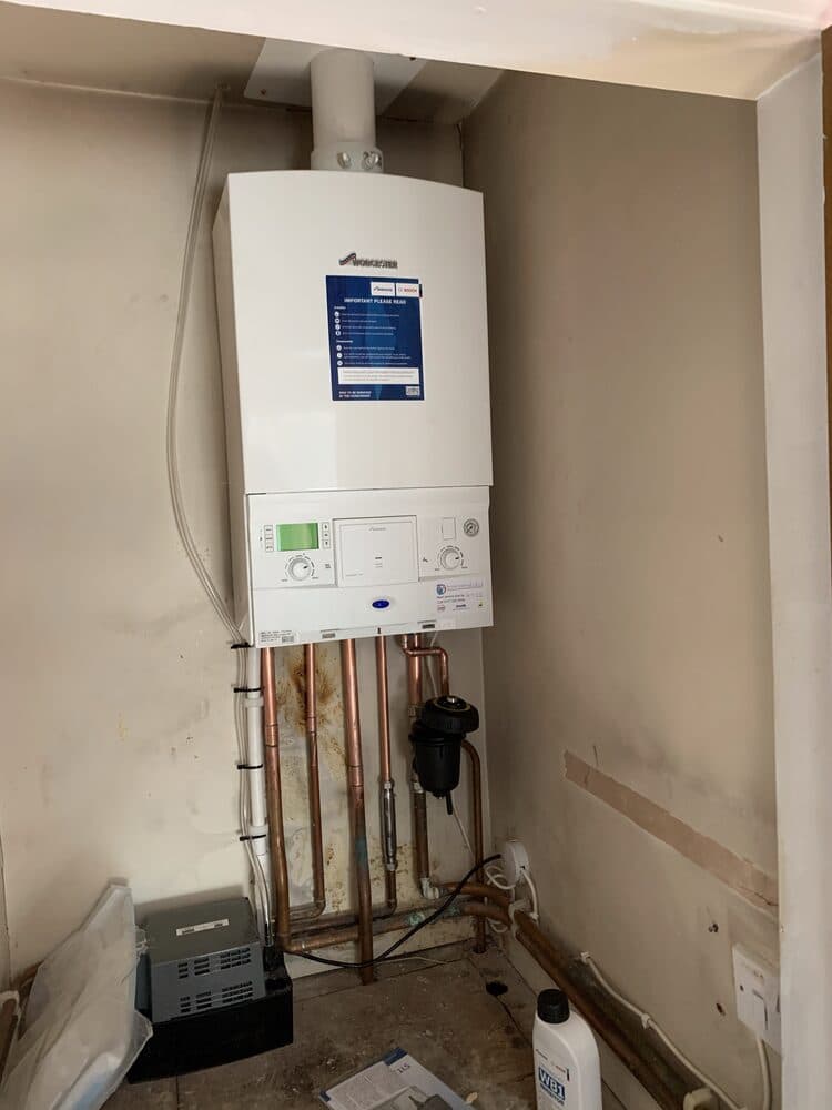 Worcester Bosch boiler neatly installed with tidy copper pipework