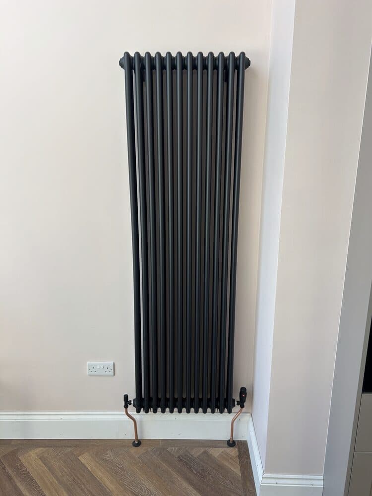 Traditional column radiator installed in a living room
