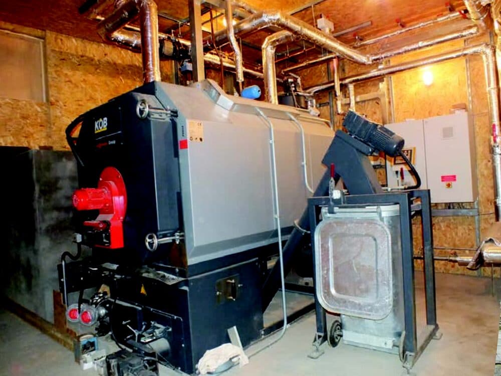 Commercial oil-fired boiler installation in a plant room