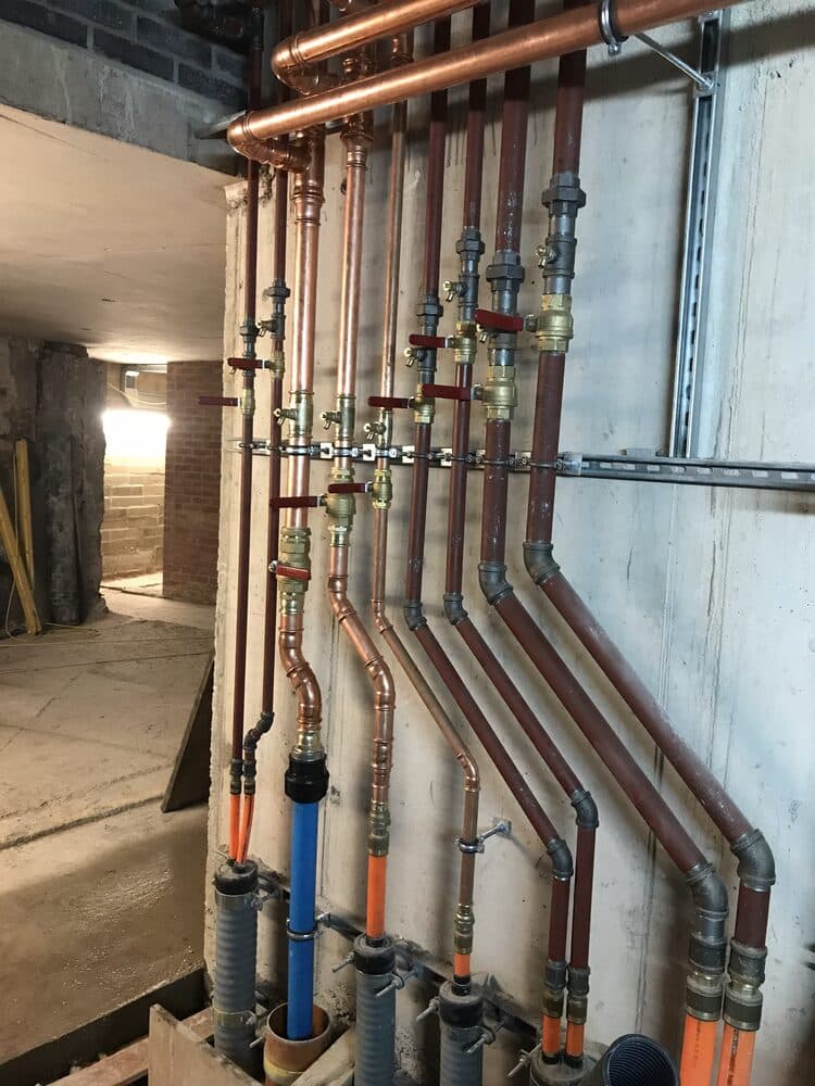 Communal heating pipework distribution in an apartment plant room