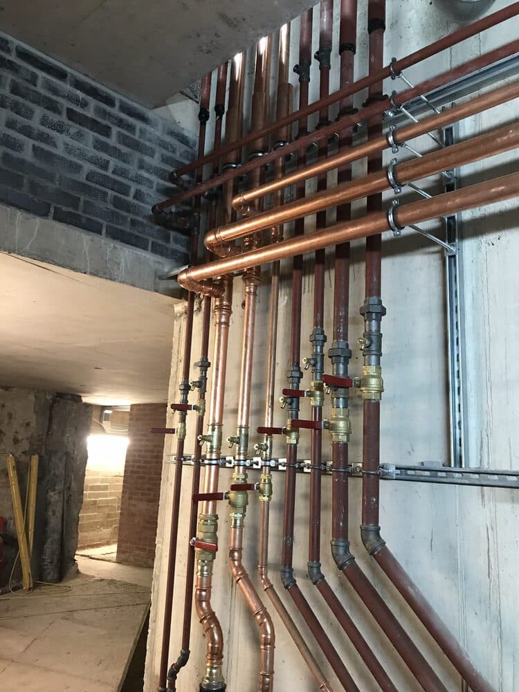 Communal heating pipework distribution in an apartment plant room