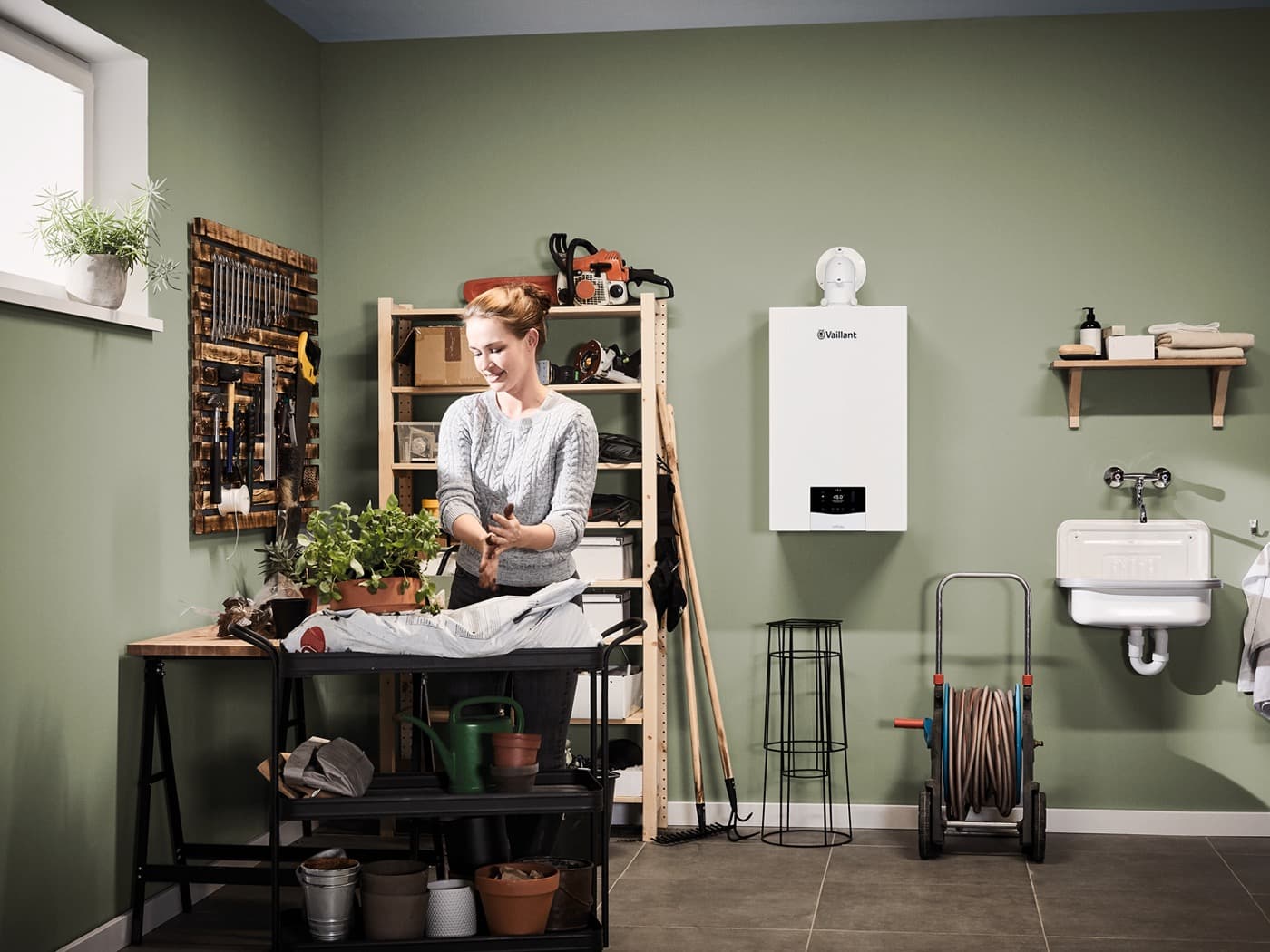 Modern condensing boiler installed in a utility room