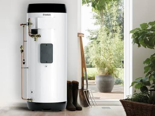 Vaillant unvented cylinder installed in a utility room next to garden doors